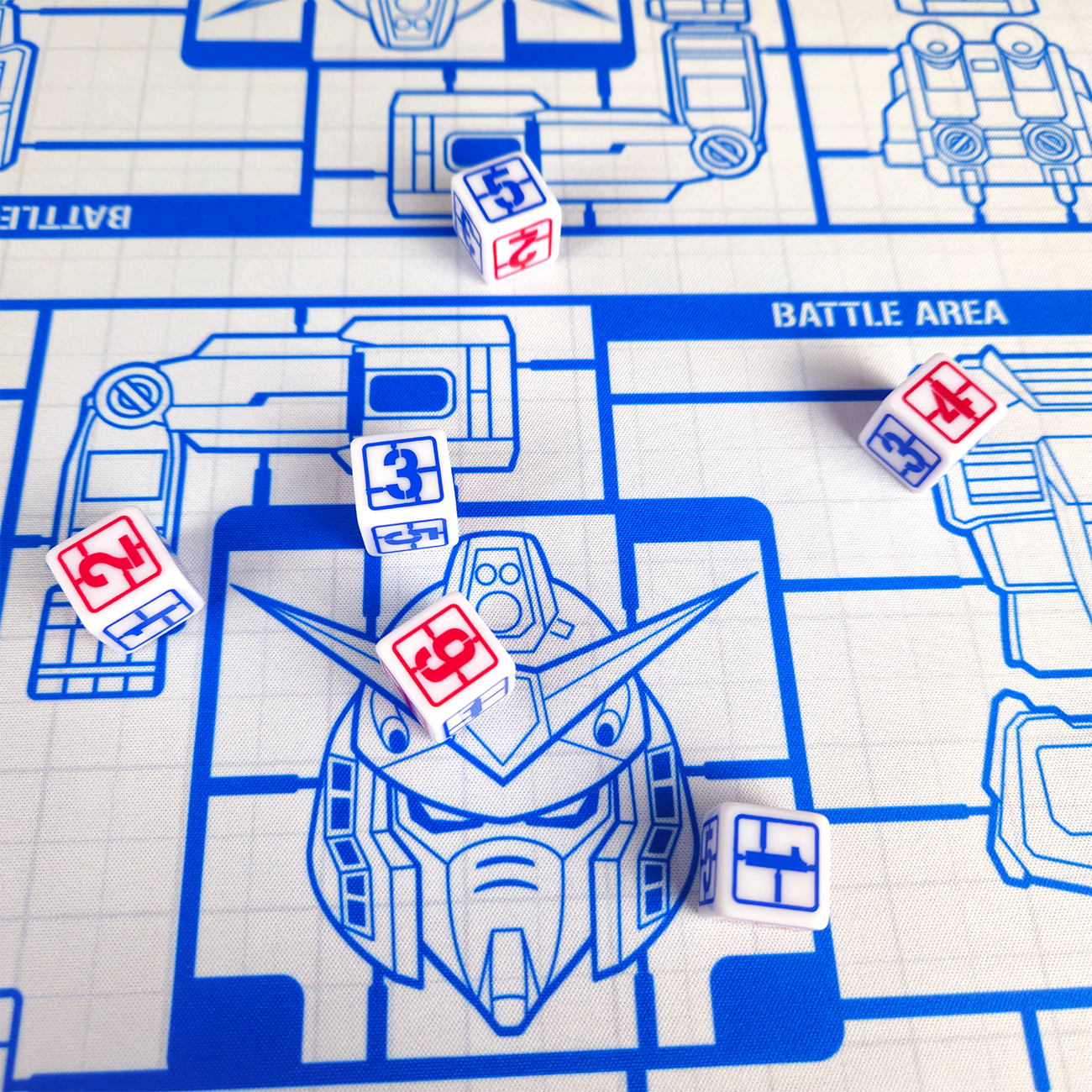 First Assembly Dice on rubber playmat.