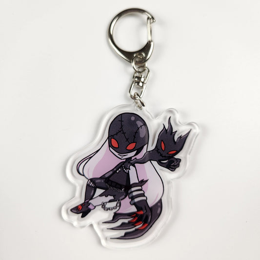 Devil's Scheme keychain for card game enthusiasts.