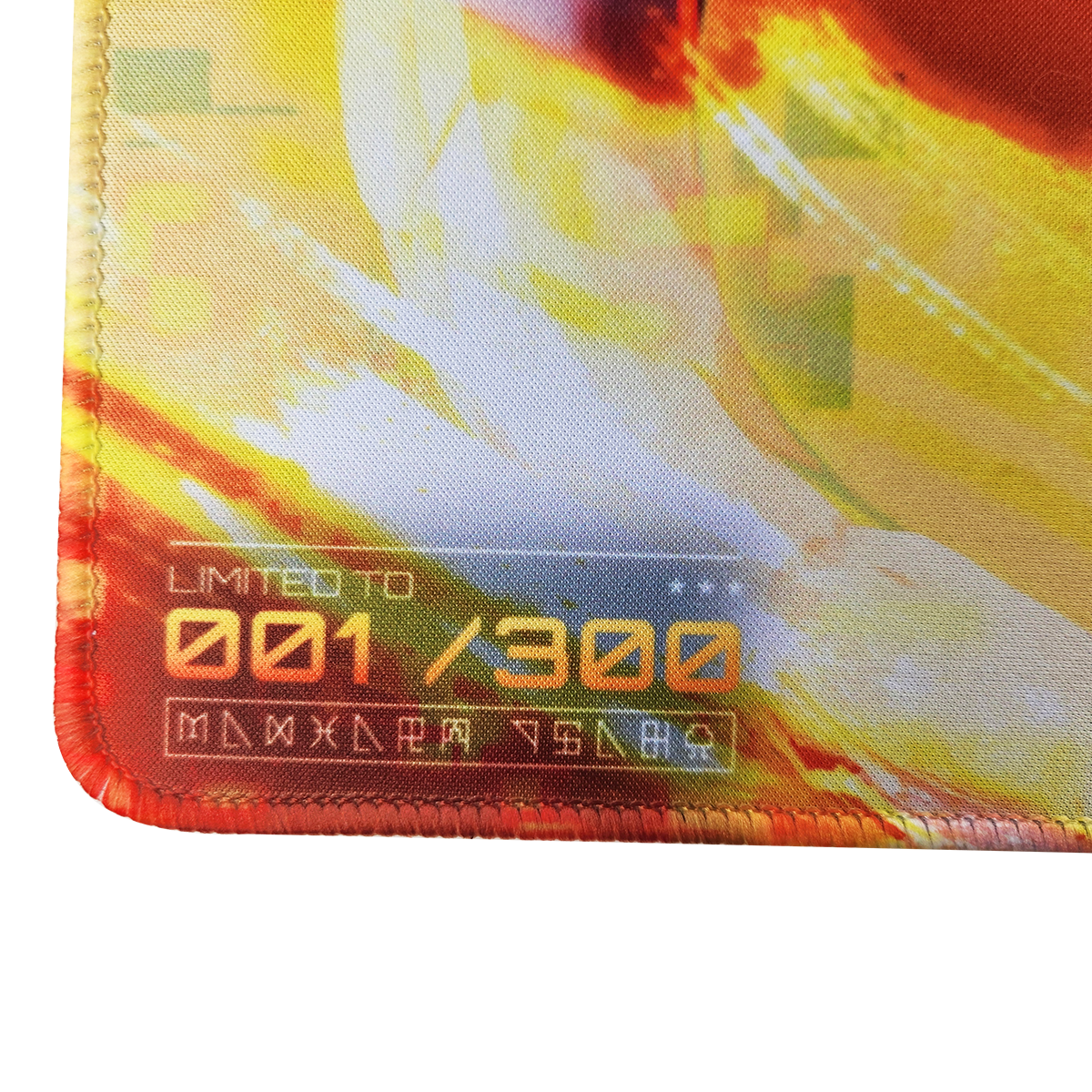 Close-up of a colorful playmat with a limited edition label on a white background